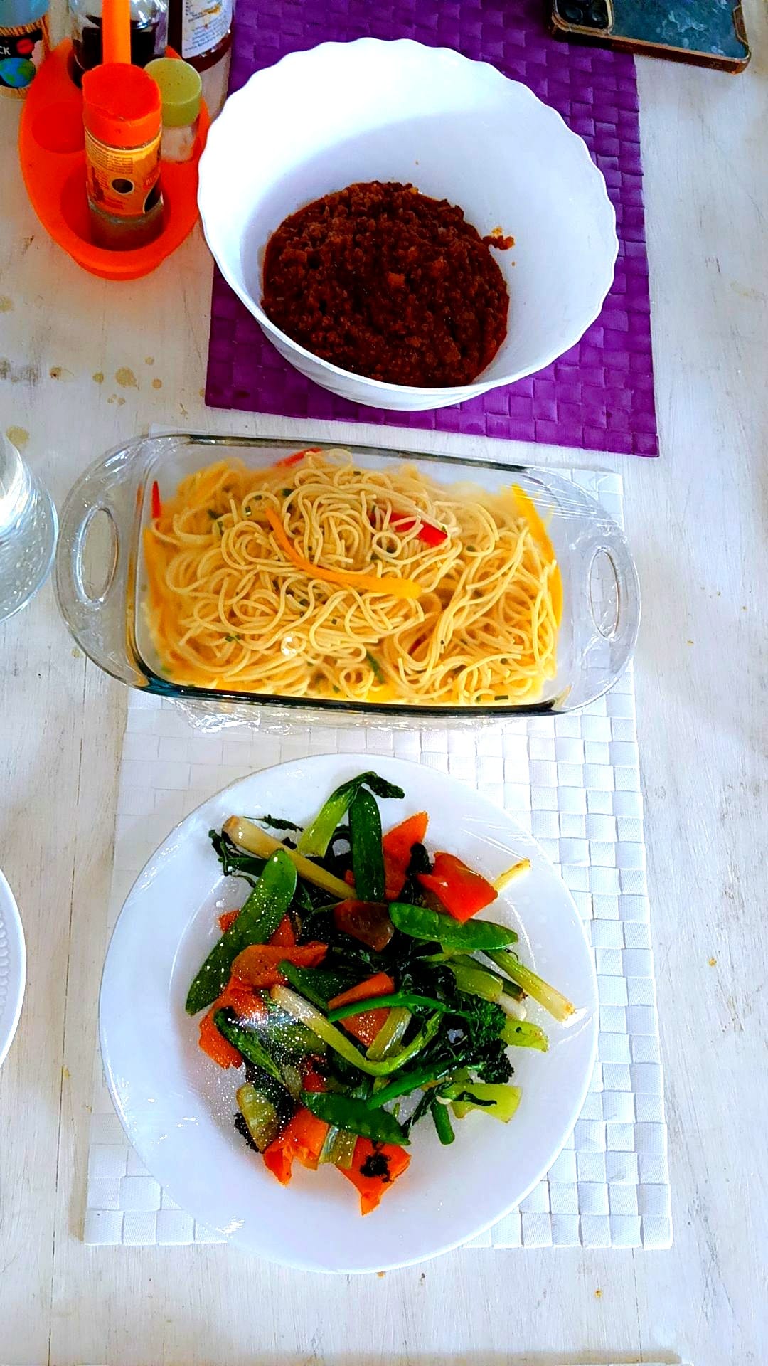 Spaghetti Bolognese with sautéed vegetables prepared by Chef Angie